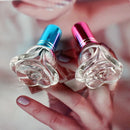 Botella de perfume transparente rellenable